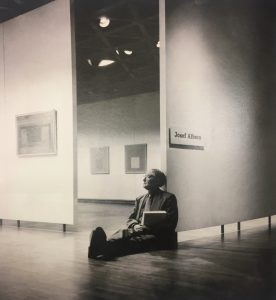 Albers on the floor of his exhibition in Yale, 1956